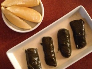 stuffed grape leaves in tahini lemon sauce