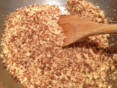 incorporate sugar/tahini paste into chopped nuts