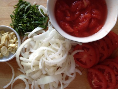 onions, garlic, crushed tomatoes and fresh basil