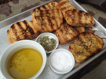 generously brush grilled slices with olive oil right off the grill