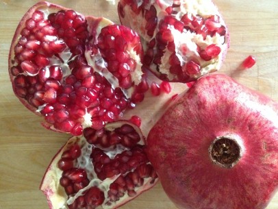 a ruby, ripe pomegranate