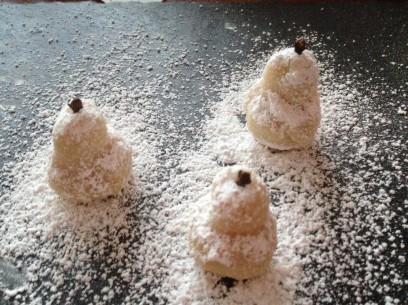 dust marzipan pears liberally with powdered sugar and top with whole clove