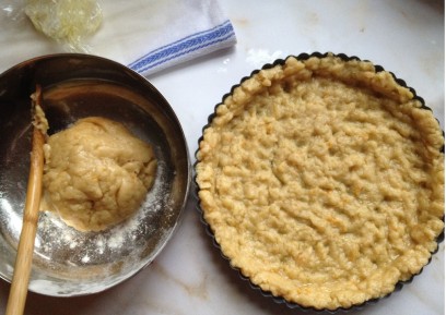 pasta flora dough in tart pan with divots